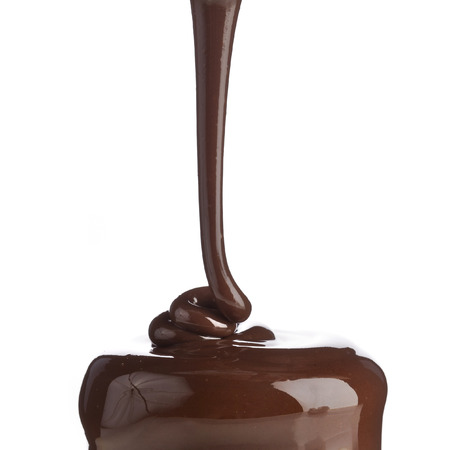 chocolate cocoa flow isolated on white background , close upの写真素材