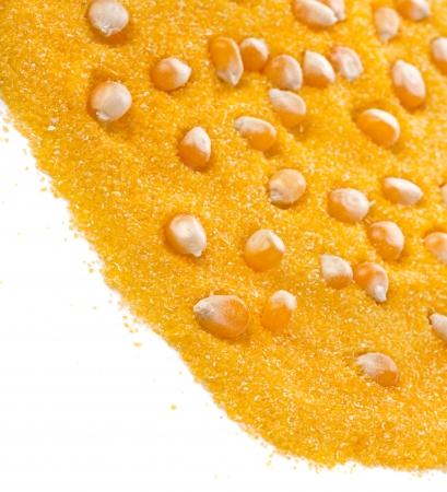 border heap of cornmeal maize flour surface isolated on white backgroundの写真素材
