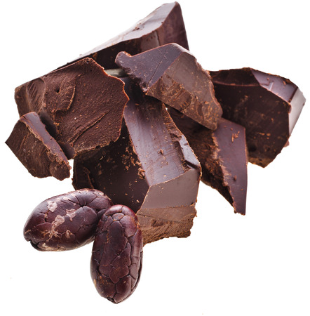 Chopped chocolate bar and cocoa beans isolated on white backgroundの写真素材