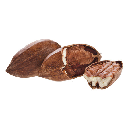 Pecan nuts pile heap close up, isolated on white 