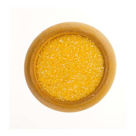 cornmeal maize flour surface in wooden bowl dish isolated on white の写真素材