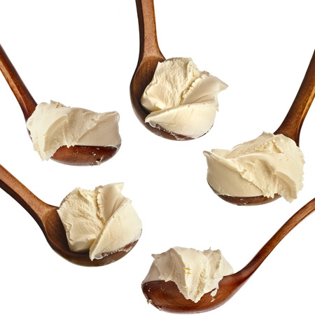 Collection set of White cream on wooden spoon Isolated on White Backgroundの写真素材