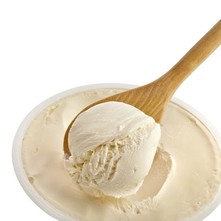White cream on wooden spoonful Isolated on White Backgroundの写真素材