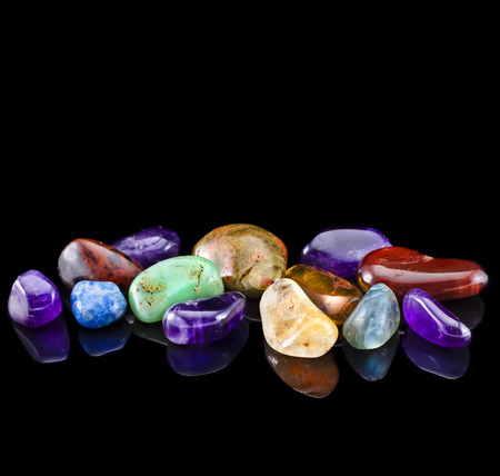 Semi-precious stones against black background with copy space for textの写真素材