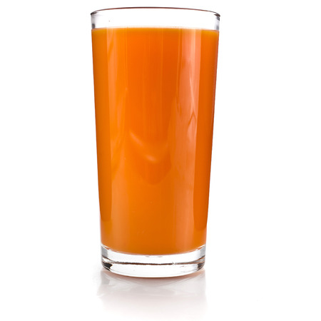 glass of carrot juice and fresh carrots grated isolated on white の写真素材