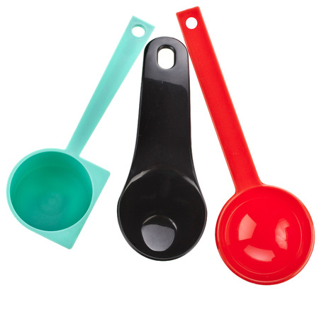 collection of colorful plastic disposable scoop top view surface isolated on white backgroundの写真素材