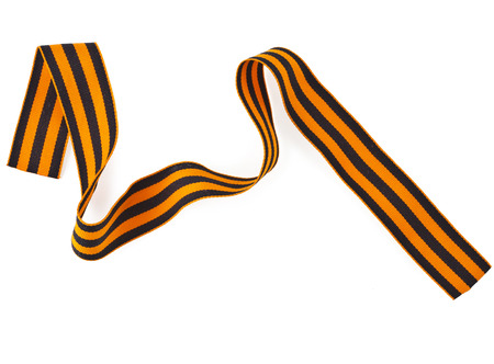 black orange strip ribbon tape surface close up isolated on white backgroundの写真素材