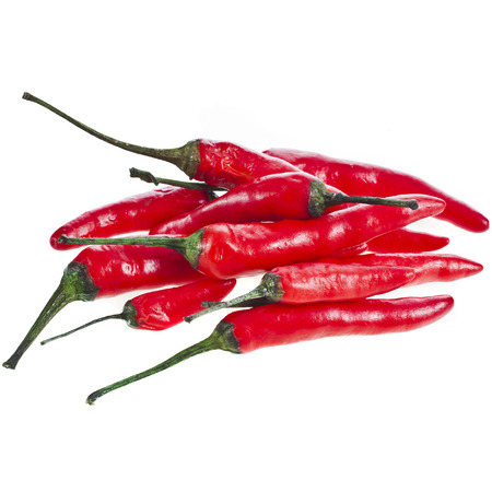 red hot pepper paprika heap pile isolated on a white backgroundの写真素材