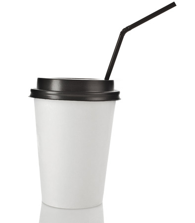 Disposable cup for hot drinks with black top and straw isolated on white backgroundの写真素材