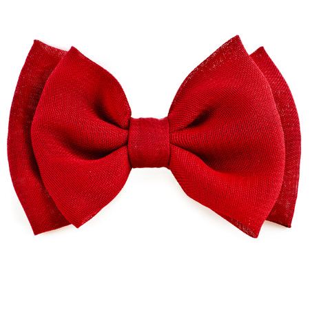 red bow tie isolated on white backgroundの写真素材