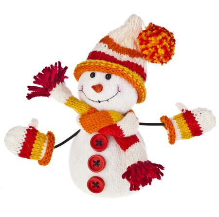 happy snowman in knitted hat and scarf and mittens isolated on white backgroundの写真素材