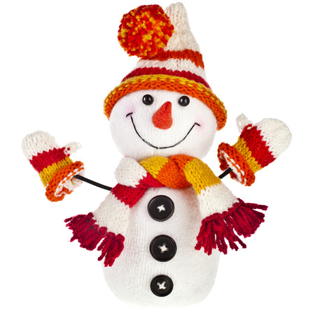 happy snowman in knitted hat and scarf and mittens isolated on white backgroundの写真素材
