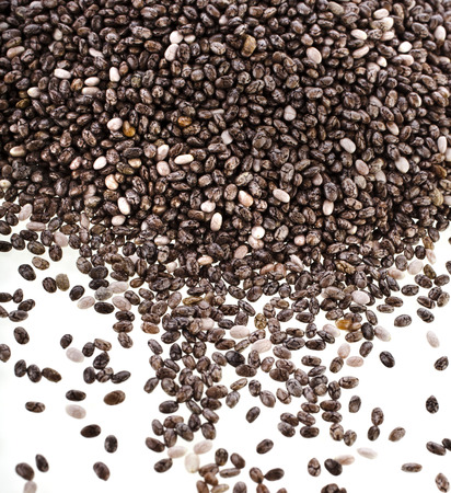 chia seeds surface close up isolated on white backgroundの写真素材