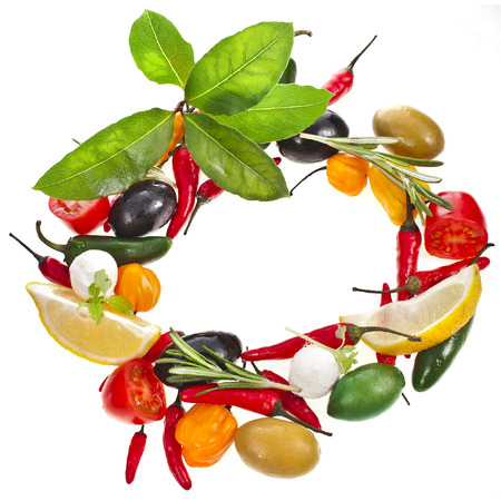 olives and variety vegetables and herb spice, frame with copy space isolated on a white backgroundの写真素材