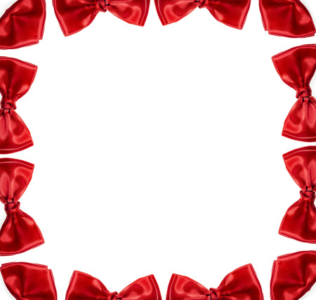 Abstract frame decor of red bow isolated on white backgroundの写真素材