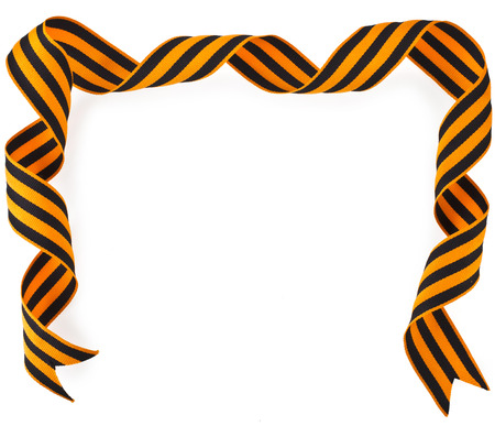 Border frame of black orange strip bow surface close up isolated on white backgroundの写真素材