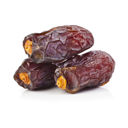 fresh dates fruits isolated on white backgroundの写真素材