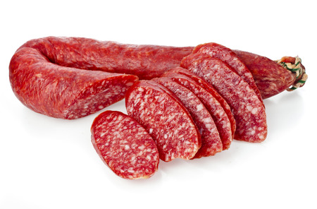 Hungarian smoked sausage with paprika isolated on white backgroundの写真素材