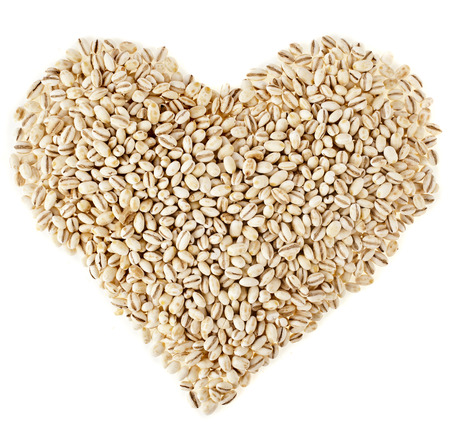 pearl barley shape heart close up surface top view backgroundの写真素材