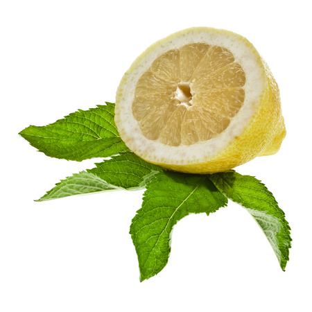 Fresh lemon with mint leaves isolated on white backgroundの写真素材