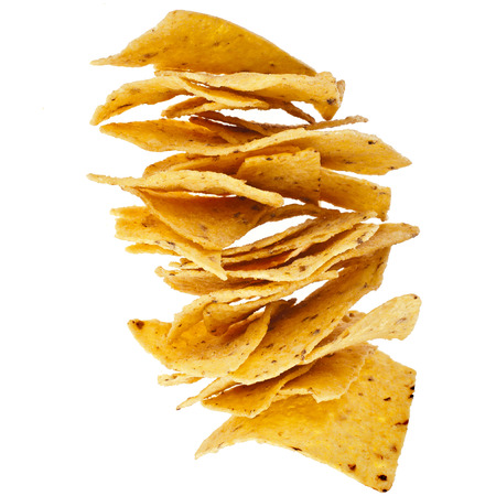 Tower heap of Mexican nachos isolated on white backgroundの写真素材