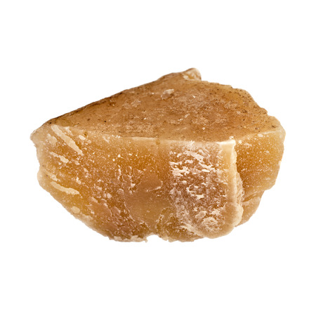 One piece of Beeswax close up isolated on a white backgroundの写真素材