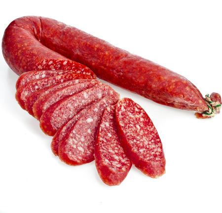 Hungarian smoked sausage with paprika isolated on white backgroundの写真素材