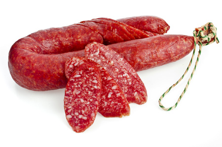Hungarian smoked sausage with paprika isolated on white backgroundの写真素材