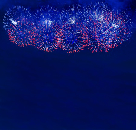 Border of Blue fireworks over night sky backgroundの写真素材