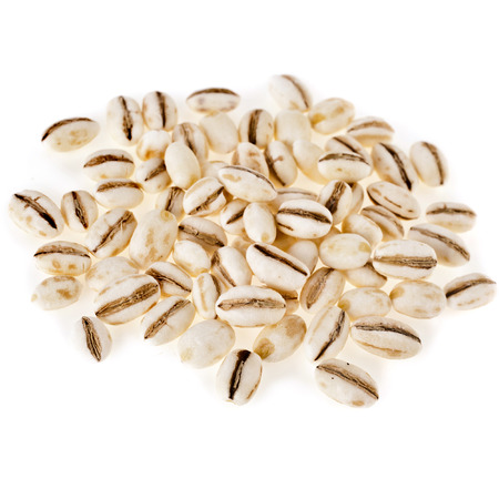 Pearl Barley Heap top view surface close up macro isolated on white Backgroundの写真素材