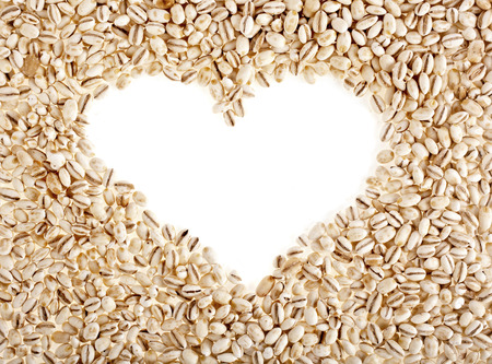 pearl barley frame shape heart close up surface top view backgroundの写真素材