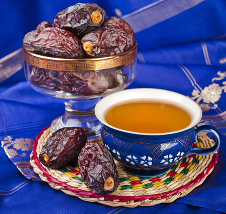 Black coffee with dates - a middle eastern refreshment drinkの写真素材