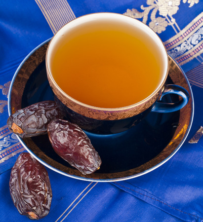 Ramadan eastern refreshment drink with dates on table top viewの写真素材