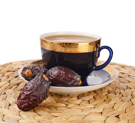 Black coffee with dates - a middle eastern refreshment drinkの写真素材
