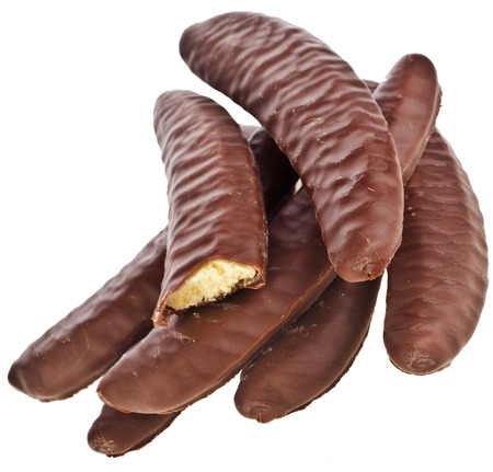 banana with chocolate isolated on a whiteの写真素材