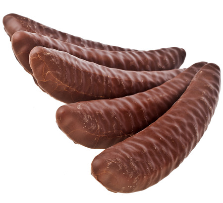 banana with chocolate isolated on a whiteの写真素材