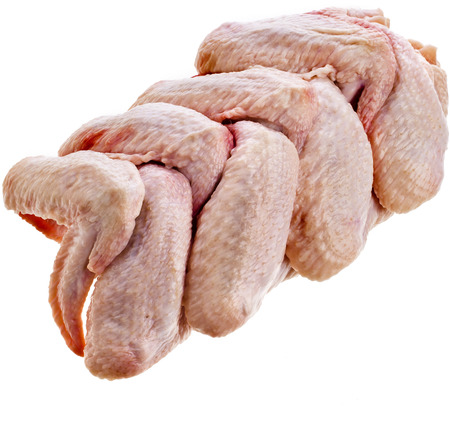 raw chicken wings on a white backgroundの写真素材