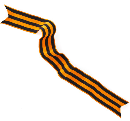 St. George ribbon tape - symbol of russian military prowess close up isolated on whiteの写真素材