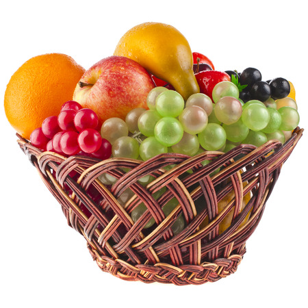 tasty summer fruits in basket isolated on white backgroundの写真素材