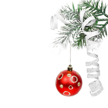 Border of Christmas branch with red ball isolated on white backgroundの写真素材