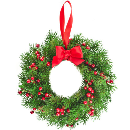 Christmas decoration wreath with red ribbon bow isolated on white backgroundの写真素材