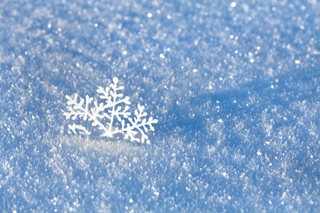 winter snow surface cover background with snowflake close upの写真素材