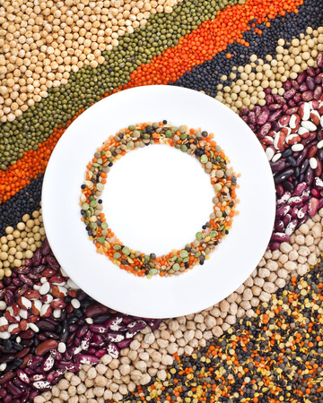 colorful striped rows of lentils, beans, peas, soybeans, legumes, seed, backdropの写真素材