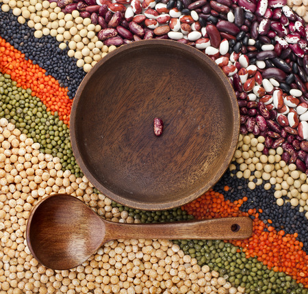 colorful striped rows of lentils, beans, peas, soybeans, legumes, seed, backdropの写真素材