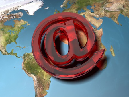 E-mail symbol on world-map, red glassの写真素材