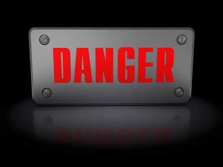 3d illustration of steel plate with text danger, over dark backgroundの写真素材