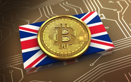 3d illustration of bitcoin over circuit background with UK flagの写真素材