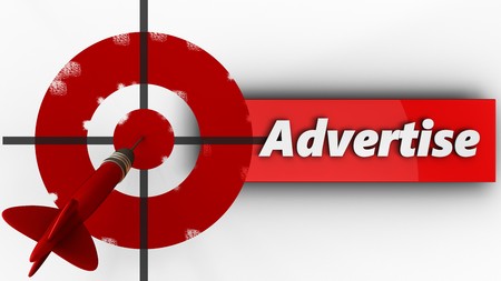 3d illustration of painted target with advertise sign over white backgroundの写真素材