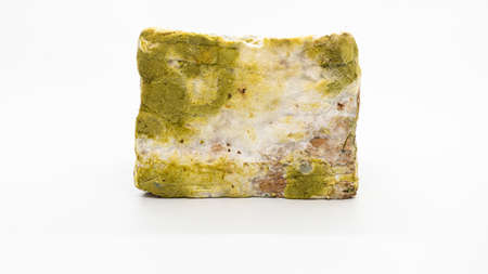 pile of sliced moldy bread, isolated on white backgroundの写真素材
