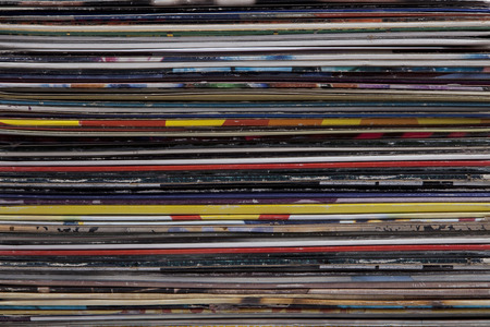 vinyl covers, different colors, retro vintage background, closeup, 